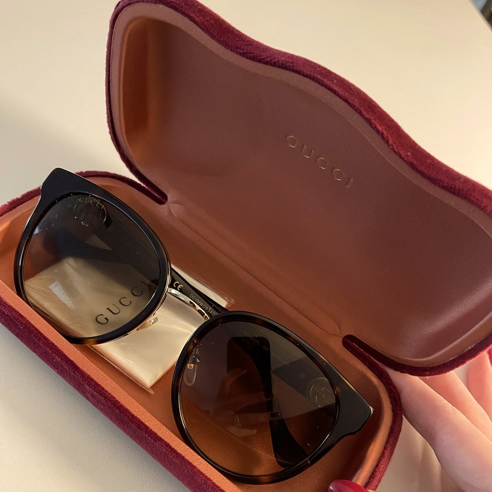 Gucci sunglasses with gold trim detail